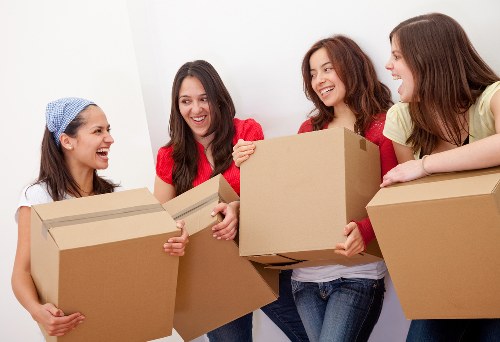 Careful packing materials and labeled moving boxes for a local Rotherhithe move