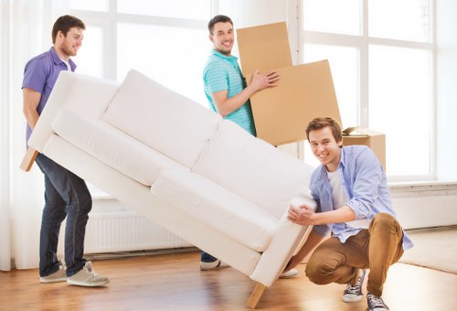 Loading furniture into a removal van in Rotherhithe