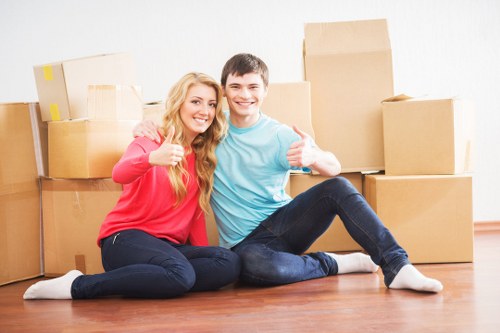 Removal team carrying items during a house move