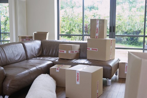 Professional movers loading office items for a relocation in Rotherhithe